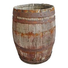 an old wooden barrel with rusted paint on it