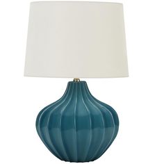 a blue lamp with a white shade on it