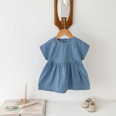 ☀️ Summer Fun Starts Here! ☀️ Your little fashionista will be the star of every playground and picnic in this adorable Soft Denim Dress. Crafted from the softest, breathable cotton worsted, it's as comfy as it is stylish. Choose from short sleeves or sleeveless for endless warm-weather fun. The classic denim look pairs perfectly with everything in her closet, making it a versatile must-have for any baby girl's wardrobe. Plus, it's machine washable for easy peasy care! This denim dress is perfect for ages 6-36 months and makes an amazing gift for baby showers or birthdays. #babygirlclothes #summeroutfit #babyfashiontrends #babygirldress #denimdress Specifications: Style: Casual Season: Summer Age Range: 6 - 36 months Gender: Girls Material: Cotton Fabric Type: Worsted Pattern Type: Solid Sl Kids Princess Dresses, Baby Fashion Trends, Sister Outfits, Denim Short Dresses, Summer Outfits Kids, Princess Dresses, Romper Outfit, Girls Blouse, Girls Wardrobe