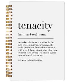 a spiral notebook with the words tenacity written in black and white on it