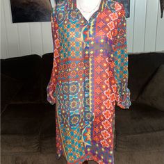 New W/Tags “Multiples” Vintage Tunic Blouse Size Medium W/ Mandala Design. This Is A Beautiful Sheer Blouse With Fall Colors. Details: 1.) Breast: 40” Inches 2.) Waist: 42” Inches 3.) Hip: 40” Inches 4.) Sleeve Length: 23-26” In. (Can Roll Up For Style) 5.) Shoulder To Shoulder: 16” In. 6.) 7 Buttons For Closure 7.) Shoulder To Hem: 35” Inches 8.) Size Medium 9.) 100% Polyester 10.) Machine Wash 11.) Made In China Thanks For Looking & Please Look At My Listings For More Clothes!!! Vibrant Long Sleeve Vacation Blouse, Vibrant Long Sleeve Blouse For Vacation, Casual Yellow Tunic Blouse, Vintage Multicolor Blouse For Day Out, Spring Vintage Blouse With Colorful Pattern, Casual Multicolor Blouse With Vintage Print, Yellow Bohemian Blouse For Daywear, Multicolor Flowy Tunic Blouse, Flowy Multicolor Tunic Blouse