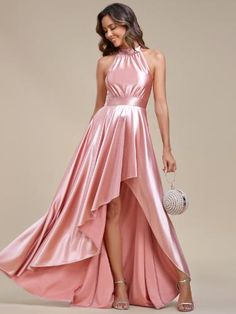 This elegant belly collar high-low A-line satin halter bridesmaid dress exudes timeless charm and sophistication. Perfect for weddings and formal occasions, its high-low hemline adds a touch of playfulness, while the satin material drapes beautifully, creating a flattering silhouette. Make a lasting impression as you walk down the aisle or dance the night away in this stunning dress. Crepe Satin Ruffle High-low Bridesmaid Dress, Calvin Klein High-low A-line Gown, Luxury Elegant A-line Halter Dress, Assymetrical Bridesmaid Dress, High Low Bridesmaid Dresses, Halter Bridesmaid Dress, Affordable Bridesmaid Dresses, Pink Bridesmaid Dresses, Ever Pretty