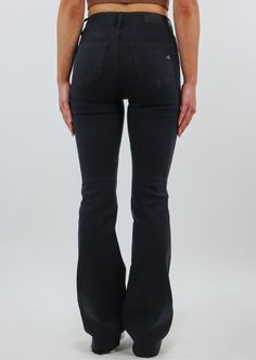 These high-waisted black flare jeans are everything you need and more in a pair of jeans! The high-waisted fit makes these pants flattering on everyone. We also love how they are tight on the thighs and then flare out at the bottom which makes them stand out against your average pair of black jeans! You should definitely pair these with your favorite going-out top or a sweater for a more relaxed look. Model Info Meet Helena! Here she is wearing a size 24. Hips: 35" | Waist: 26" | Bust: 33" | Hei Black High Rise Fitted Flare Jeans, High Waist Washed Black Flare Jeans, Black High Rise Washed Flare Jeans, Party Jeans, Black Non-stretch Flare Jeans With Pockets, Black Non-stretch Cotton Flare Jeans, Black Flare Jeans, Black Flare, High Waisted Flares