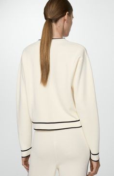 Find MANGO Contrast Trim Sweater on Editorialist. Contrast trim brings a little something extra to this easy sweater with dropped shoulders that create a relaxed fit. Crewneck Long sleeves 73% viscose, 27% polyester Hand wash, line dry Made in Turkey Chic Ribbed Collar Sweater For Loungewear, Chic Cream Sweater With Ribbed Neckline, Chic Cream Crew Neck Cardigan, Chic Crew Neck Cardigan With Ribbed Cuffs, Chic White Sweater With Ribbed Neckline, Long Sleeve Tops With Contrast Trim For Fall, Cream Ribbed Collar Top For Loungewear, Casual Tops With Contrast Trim For Fall, White Sweater With Ribbed Neckline For Work