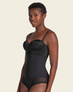 This incredible waist cincher made with our super comfy compression SkinFuse® fabric features flexible boning on the sides and back for extra support. It's functional and discrete! You can wear it all day, every day, since it has no noticeable seams, making it invisible under clothes. We guarantee the highest quality and comfort from this piece because you deserve the best. You can wear it daily to improve your posture, during workouts at the gym, after surgery, or postpartum. Stretch Nylon Corset With Built-in Bra, Fitted Full Coverage Corset With Built-in Bra, Nylon Compression Shapewear With Full Coverage, Nylon Shapewear With Medium Bust Support And Full Coverage, Compression Nylon Full Coverage Shapewear, Full Coverage Compression Shapewear In Nylon, Black Stretch Shapewear With Built-in Padding, Compressive Nylon Shapewear With Medium Bust Support, Compressive Full Coverage Shapewear With Built-in Padding