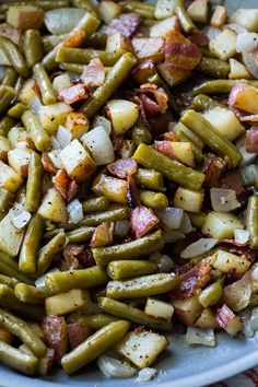 potatoes and green beans in a white bowl