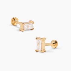 Get ready to add some sparkle to your style with our Zola Baguette Flat Back Earrings! These eye-catching earrings feature a baguette-shaped CZ for an elegant touch, and a unique flat back disc closure for a comfortable fit. A must-have for any jewelry collection. Available in 14k gold vermeil Size: 4mm x 2mm baguette cz Post that screws with flat back disc SKU: BYE1185 Modern Gold Baguette Earrings, Modern Baguette Gold Earrings, Modern Baguette-shaped Gold Earrings, Modern Baguette Earrings As Gift, Tennis Jewelry, Flat Back Earrings, Monogram Initials, Turquoise Jewelry, Birthstone Jewelry