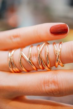 A bold, layered ring. This beautiful wrapped ring will become a staple in your wardrobe. This ring is handcrafted out of a D-shaped (half round) wire that is wrapped multiple times to create the appearance of three stacked rings. This listing is for ONE SINGLE ring in 14K ROSE GOLD FILL. Made from Extra Thick 2mm metal. SIZING NOTE: Because this style is wider than a classic Stacking Ring, we recommend sizing up* by a QUARTER to a HALF size from your US Fashion Ring Size (Bridal size is differen Rose Gold Stackable Open Band Rings, Stackable Rose Gold Open Band Midi Rings, Stackable Rose Gold Midi Rings With Open Band, Rose Gold Stackable Midi Rings With Open Band, Rose Gold Midi Rings With Open Band, Modern Twist Rose Gold Stackable Rings For Wedding, Modern Twist Rose Gold Stackable Wedding Rings, Modern Twist Rose Gold Ring, Modern Rose Gold Stackable Wedding Rings