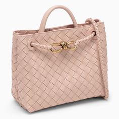 Small leather bag from Bottega Veneta featuring a colour Lotus Intrecciato pattern, a slide handle and shoulder strap, a metal Knot detail on the front, an internal flat pocket, an internal zipped pocket and gold-tone metal hardware. Composition: 100% Lambskin | Bottega Veneta Women's Andiamo Light Pink Small Bag in Rose | SS24 Shopping Bags With Gold-tone Hardware And Top Handle, Elegant Shoulder Bag With Braided Round Handles, Designer Bags With Braided Handles And Top Handle, Designer Bags With Top Handle And Braided Handles, Chic Shopping Bags With Gold-tone Hardware, Chic Bags With Braided Handles And Top Handle, Chic Top Handle Bag With Braided Handles, Chic Bags With Braided Top Handles, Chic Satchel Bags With Gold-tone Hardware