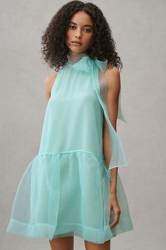 The BHLDN Sophia High-Neck Bow-Tie Organza Mini Dress exudes feminine elegance with its delicate organza fabric, high neckline, and charming bow detail. | Sophia High-Neck Bow-Tie Organza Mini Dress by BHLDN in Mint, Women's, Size: Medium, Polyester at Anthropologie A Line Dress Organza, Blue Organza Dress, Organza Mini Dress, Sundress Season, Blue Organza, Feminine Elegance, Neck Bow, Organza Dress, Organza Fabric