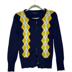 Gap Sweater Womens XS Cardigan Button Argyle Diamond Nordic Navy Blue Yellow Please use photos and zoom as part of the description Flat Lay Measurements Sleeve - 23" Chest - 15.5" Length down center back - 22" Thanks for viewing! Blue Button-up Gap Outerwear, Vintage Multicolor Cardigan With Buttons, Vintage Blue Sweater With Button Closure, Blue Vintage Button-up Cardigan, Long Sleeve Argyle Cardigan, Argyle Diamonds, Gap Sweater, Colorful Fashion, Blue Yellow