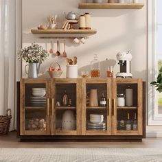 a wooden cabinet filled with lots of dishes and cups on top of shelves next to a window