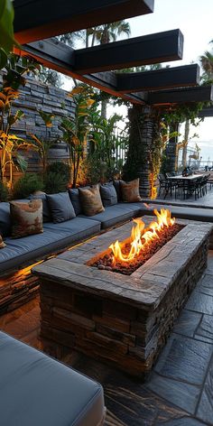 a fire pit sitting on top of a stone patio