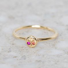 This mini pebble ring has been set with three different coloured sapphires in tones of pink, orange and yellow. Band width 1.2 mm Pebble measures 5.6mm round. Weight 1.3g (approximately) Pictured here with a high shine finish. For a matte finish please leave a note at checkout. Pebble Ring, J Us, Orange And Yellow, My Size, Instagram Icons, Pink Orange, Ring Size, Sapphire, White Gold