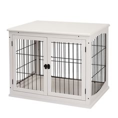 a white birdcage with two doors and one door open