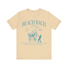 a t - shirt with the words beach bach and an image of two people sitting at a