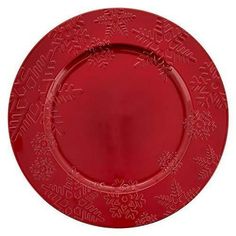 a red plastic plate with snowflakes on the rim and writing across the edge