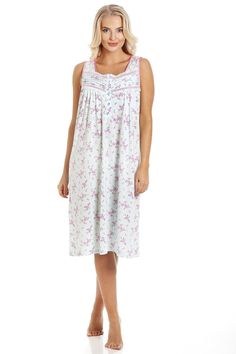 Relax and unwind in this beautiful Classic nightdress. The pretty floral print design gives it an extra feminine feel. Available in Pink or Aqua Shipped From a Small UK Business Made From 65% Polyester & 35% Combed Cotton Feminine Floral Print Loungewear Nightgown, Summer Floral Print Nightgown For Bedtime, Feminine Floral Print Nightgown For Loungewear, Feminine Beach Nightgown, Spring Floral Print Sleeveless Nightgown, Feminine Floral Print Nightgown For Daywear, Feminine Sleeveless Sleepwear, Feminine Sleeveless Sleepwear For Night, Floral Print Sleep Dress