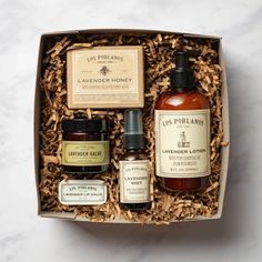 The Apothecary Collection features Los Poblanos favorite tried and true products that are created with all-natural ingredients, including essential oil from certified organic Grosso Lavender that is grown and distilled on the farm. Ideal for everyday use in any climate, this thoughtful collection will cleanse, moisturize, soothe and refresh. Beautifully packaged in a reusable box, the Apothecary Collection is ready to gift right off the shelf. This set is packaged together in a Los Poblanos bran Body Lotion Packaging, Lavender Hand Soap, Lip Salve, Lavender Lotion, Lavender Honey, Artisan Food, Honey Soap, Organic Farm, Farm Shop