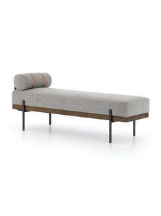 a bench with a cushion on top of it