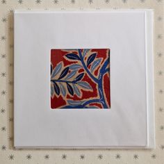 an image of a red and blue design on white paper