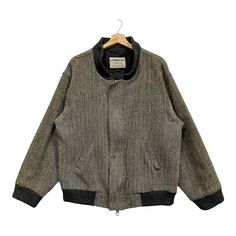 PLEASE ASK ANY QUESTION BEFORE BUYING  THIS IS USED CLOTHING PLEASE DON'T EXPECTED IT TO BE LIKE NEW OR IN PRISTINE CONDITION!! Vintage 90s Harris Tweed Wool Bomber Jacket  Tag Harris Tweed Material wool Size on tag L (large) Measures About (Approximately)  -Armpit to Ampit : 24.5 inch  -Length (back collar down) : 28 inch -Shoulders : 21 inch  -Sleeve Length : 23 inch Condition : used good condition  9/10 **No Tears, No Stains And No Holes** PLEASE READ THE DESCRIPTION AND POLICY BEFORE BUYING Casual Winter Tweed Jacket, Retro Winter Tweed Jacket With Pockets, Retro Tweed Jacket With Pockets For Winter, Winter Retro Long Sleeve Tweed Jacket, Retro Wool Tweed Jacket For Winter, Retro Winter Wool Tweed Jacket, Retro Tweed Outerwear, Retro Long-sleeved Tweed Outerwear, Retro Long Sleeve Tweed Outerwear