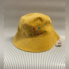 Your Kid Will Be Ready For Their Sunny Adventures With The 'Lets Be Friends' Bucket Hat From Cat And Jack In Mustard Yellow. Made From Soft Material, This Attractive Hat Offers A Comfy Fit And The Broad Brim Will Protect Their Eyes From The Sun. This Bucket Hat Makes A Great Pick For Beach And Picnic Days And Also Pairs Well With Any Casual Outfit For An Exciting Look. Classics With An Imagination Of Their Own. Color: Mustard/Yellow. Pattern: Letters. Material: Polyester Fb1-003 Playful Yellow Bucket Hat For Spring, Playful Yellow Hats For Spring, Yellow Cotton Bucket Hat For Spring, Fun Yellow Bucket Hat For Spring, Playful Yellow Hat For Spring, Cute Yellow Adjustable Hat, Cute Adjustable Yellow Hat, Casual Yellow Cotton Bucket Hat, Playful Yellow Bucket Hat With Curved Brim