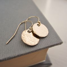 These simple disc earrings are perfect for everyday wear! Hand hammered finish Choose from: ~sterling silver ~14K yellow gold filled ~14K rose gold filled Discs measure 9mm in diameter. >>To enter to my shop<< http://www.kgarnerdesigns.etsy.com Please contact me PRIOR TO PURCHASE if you are ordering on a deadline. I can usually accommodate quick shipping if I am made aware of your deadline. *Expedited shipping is available during checkout.* Most items are ready to ship 2 business day Everyday Hammered Rose Gold Earrings, Everyday Rose Gold Hammered Earrings, Hammered 14k Gold-filled Rose Gold Earrings, Hammered Rose Gold Earrings 14k Gold Filled, Rose Gold Hammered 14k Gold-filled Earrings, Simple Hammered Everyday Earrings, Everyday Hammered 14k Gold Filled Earrings, Simple Everyday Hammered Earrings, Minimalist Hammered Round Disc Earrings