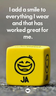 a yellow dice with a smiley face on it and the words i add a smile to everything i wear and that has worked great for me