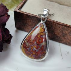 Plum Root Agate Pendant, 925Sterling Silver Pendant, Gemstone Pendant, Agate Handmade Jewelry, Birthday Day Gift, Women's Jewelry, Gift Idea Gemstone Pendant Gemstone- Plum Root Agate  Stone Type- Natural Polish- Silver  Metal- 925 Sterling Silver Pendant Size- 25x45 MM Weight- 7.90 Gram Theme- Love & Friendship Style- Boho & Hippie Product Status: Ready to Ship You can also have a look on our other amazing products here- PureSoulJewels:- https://www.etsy.com/shop/PureSoulJewels?ref=seller-platf Sterling Silver Gemstones With Natural Stones For Anniversary, Anniversary Sterling Silver Gemstones With Natural Stones, Sterling Silver Teardrop Gemstones Gift, Sterling Silver Teardrop Gemstones For Anniversary, Handmade Sterling Silver Gemstones For Anniversary, Teardrop Sterling Silver Gemstone For Anniversary, Silver Carnelian Jewelry For Anniversary, Unique Sterling Silver Gemstones For Gifts, Unique Agate Gemstones For Gift