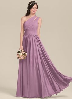 a bridesmaid in a purple dress with one shoulder and pleaed skirt, holding a bouquet