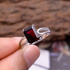 WELCOME TO ARTNGEM IIndian Gemstone Ring,Ring Size 7,Natural Red Garnet Gemstone 2.9 Gram Radiant Shape Ring ,92.5 Silver Delicate Ring,TOP Garnet January Gift Gemstone : Garnet Stone Shape : Radiant Stone size :9x7 MM Ring Weight :- 2.9 Gram Ring Size : 7 US 92.5 Sterling Silver Ring Quantity : Buyer Will Get Received One Ring BEST QUALITY AT LOW PRICE. = = = = = = = = = = = = = = = = = = = = = = = = = = = = = = = PLEASE ADD THIS IN YOUR CART FOR FAST SHIPPING WITH OTHER ITEMS. https://www.etsy Silver Emerald Ring With Rectangular Stone For Gift, Silver Emerald-cut Emerald Ring As Gift, Garnet Stone Setting Rings As Gift, Rectangular Stone Birthstone Ring With Prong Setting, Emerald Cut Garnet Rings For Gift, Emerald Cut Garnet Rings As Gift, Ruby Gemstone Rings With Rectangular Stone, Fine Jewelry Ring With Rectangular Stone For Gift, Fine Jewelry Rings With Rectangular Stone For Gift