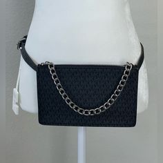 Black Synthetic Material With Mk Logo All Over In A Dark Gray Color. Silver Metal Chain At Zipper. Belt Is Size Small. Bag Is 8 X 5 And Almost An Inch In Width. Black Shoulder Bag With Belt Loops, Trendy Michael Kors Black Bag, Michael Kors Trendy Black Shoulder Bag, Trendy Michael Kors Black Shoulder Bag, Trendy Black Michael Kors Shoulder Bag, Casual Black Michael Kors Bag, Michael Kors Belt, Zipper Belt, Michael Kors Backpack