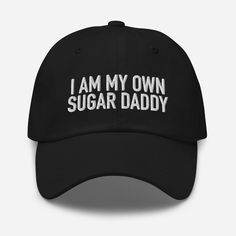 "Embrace your independence and sense of humor with our 'I am My Own Sugar Daddy' meme dad hat - a playful way to show the world that you don't need anyone to spoil you, because you're already taking care of yourself like a boss. Classic Dad Hat | Yupoong 6245CM Dad hats aren't just for dads--this cap is trendy and stylish. It has an unstructured form, a curved visor, and an adjustable buckle strap. Comfort + style = win/win! 100% chino cotton twill Green Camo color is 35% chino cotton twill, 65% polyester Unstructured, 6-panel, low-profile 6 embroidered eyelets 3 ⅛\" (7.6 cm) crown Adjustable strap with antique buckle Feel free to message us with any questions you may have! ️" Funny Snapback Cap With Letter Print, Customizable Funny Cap, Father's Day Dad Hat With Letter Print, Funny Hats With Letter Print And Curved Brim, Funny Curved Brim Hat With Letter Print, Funny Dad Hat With Letter Print, Funny Letter Print Baseball Cap, Father's Day Snapback Cap With Letter Print, Father's Day Letter Print Snapback Cap