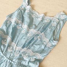 "Baby blue beauty. This super sweet light cotton frock has cotton scallop lace details on its bodice that really brings it to next level loveliness. Back metal zip. Condition: Excellent Label: None. Well made. Bust 33/34\" Waist 24\" Length 39\" (4\" to let) This item is clean and ready to wear. Comes from a smoke and pet free home. Don't forget to follow me on Instagram @tammaraclearshercloset for new listing alerts. This is shipping from Singapore. Standard post to the US takes about 10 workin Spring Cotton Dress With Scalloped Lace, Summer Cotton Dresses With Scalloped Lace, Summer Cotton Dress With Scalloped Lace, Cotton Summer Dresses With Scalloped Edges, Sleeveless Cotton Dress With Lace Trim, Cotton Scalloped Lace Fitted Dress, Fitted Cotton Dress With Scalloped Lace, Fitted Cotton Dress With Scalloped Edges, Spring Cotton Dresses With Scalloped Edges