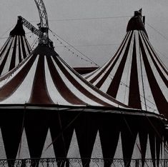 two large circus tents sitting next to each other