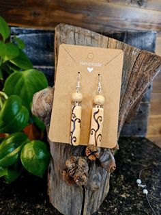 Simple drift wood and stone combine to make beautiful hook back earrings. Nature-inspired Brown Earrings With Ear Wire, Nature-inspired Dangle Earrings In Natural Color, Natural Dangle Earrings, Nature-inspired, Handmade Rustic Natural Earrings, Drift Wood, Hook Earrings, Ox, Jewelry Earrings Dangle, Bones