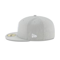 the new era 59fifty fitted cap in grey with white on the side