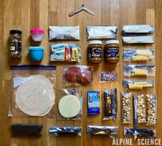 an assortment of food is laid out on the floor