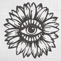 an eye is shown in the middle of a sunflower