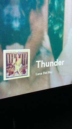 a television screen with the word thunder on it and an image of a woman's face