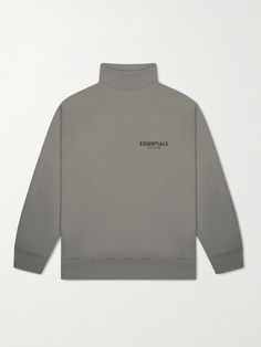 As the name suggests, Fear of God Essentials offers the sort of wardrobe staples you'll want to wear day in, day out. This sweatshirt is made from breathable cotton-blend jersey with a mock neck and detailed with the brand's logo at the chest. Gray Ribbed Collar Sweatshirt For Streetwear, Gray Sweater With Ribbed Collar For Streetwear, Streetwear Funnel Neck Sweatshirt With Ribbed Collar, Classic Gray Tops With Ribbed Collar, Classic Gray Sweatshirt With Ribbed Collar, Casual Cotton Turtleneck In Solid Color, Athleisure Funnel Neck Top With Ribbed Collar, Casual Solid Cotton Turtleneck, Athleisure Top With Funnel Neck And Ribbed Collar