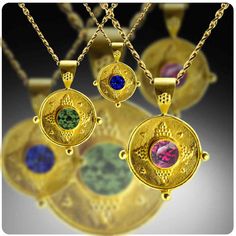 Roman inspired 22K assorted gemstone pendants #22K #granulation #ancienttechniques #ancientinspiration #highkaratgold #tourmaline #bluesapphire #customorders #coloredstones #goldsmith #GIAAlumni #22kpendants #fabricatedjewelry #handcraftedgoldjewelry Gold Gemstones With Round Gemstone Accents, Spiritual Yellow Gold Jewelry With Stone Setting, Handmade Yellow Gold Sapphire Jewelry, Gold Sapphire Gemstone Jewelry, Byzantine Style Round Gemstone Jewelry, Luxury Gold Pendant Gemstones, Gold Sapphire Round Pendant Jewelry, Luxury Gold-colored Gemstones, Artisan Gold Jewelry With Birthstone