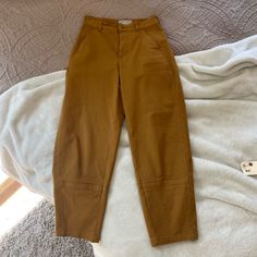 Everlane Barrel Pant! Brand New. A Warm Brown, Tan Color. Honestly Such A Flattering Fit. Sell New For Very Expensive! Brown Tapered Leg Chinos For Spring, High Waist Mustard Bottoms For Work, Brown Tapered Leg Bottoms, Mustard Bottoms With Pockets For Workwear, Mustard High Waist Bottoms For Workwear, Everlane Casual High Waist Pants, Everlane Trousers With Pockets, Everlane Barrel Pant, Mustard High-waist Bottoms For Work