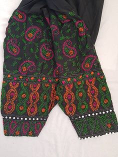 Beautiful Phulkari multicolor cotton patiala pant that is hand embroidered with multicolor wool to give you cool look.These patiala pants give a attractive look  when paired with short plain kurtas. Patiala has adjustable belts to tie. Patiala Size fits all. Fabric cotton Patiala Pant, Chandler Az, Womens Pants, Adjustable Belt, Fabric Cotton, Hand Embroidered, Belts, Pants For Women, Wool