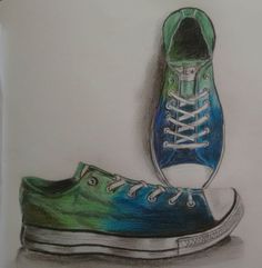 a drawing of a pair of blue and green shoes