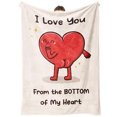 a white towel with a red heart on it that says, i love you from the bottom of my heart