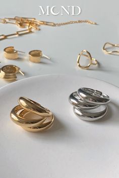 Get ready to add some serious edge to your look with this bold, quirky 3-layered chubby band ring! With three connected rings (a metal hoop on your palm side), this standout style is perfect for the season. Plus, its playful and unique design will definitely make a statement.

- Nickel-free plated brass
- Size: approx. US 6 1/2 - 6 3/4 Connected Rings, Edgy Chic, Hipster Fashion, Edgy Fashion, Band Ring, Ring Set, Ring Sets