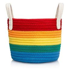 a multicolored basket with handles on the top and bottom, sitting in front of a white background