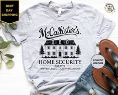 Mc Callister's Home Security Shirt , Unisex Christmas Movie Shirt Gift For Christmas, Merry Christmas Holiday Movie ORDERING: 1. Review all photos 2. Choose Size and Color from drop-down menu 3. If personalization box is available, add your text color 4. Add each shirt to cart one at a time 5. Click "Add to Cart" - you can go back to add more products 6. Click "Proceed to Checkout" 7. Add note to seller for any requests * We use several different brand shirts, all of them are premium quality and soft shirts. The brands we send may vary depending on our stock situation. * We guarantee 100% satisfaction. The brands we use in- clude premium quality shirt brands such as Bella Canvas, Gildan Soft Style, Circle, Outlash. BULK DISCOUNTS AND SPECIAL REQUESTS: We offer bulk discounts and are open t Security Shirt, Home Alone Christmas, Christmas Movie Shirts, Hallmark Movie, Home Alone, Movie Shirts, Holiday Movie, Branded Shirts, Christmas Movies